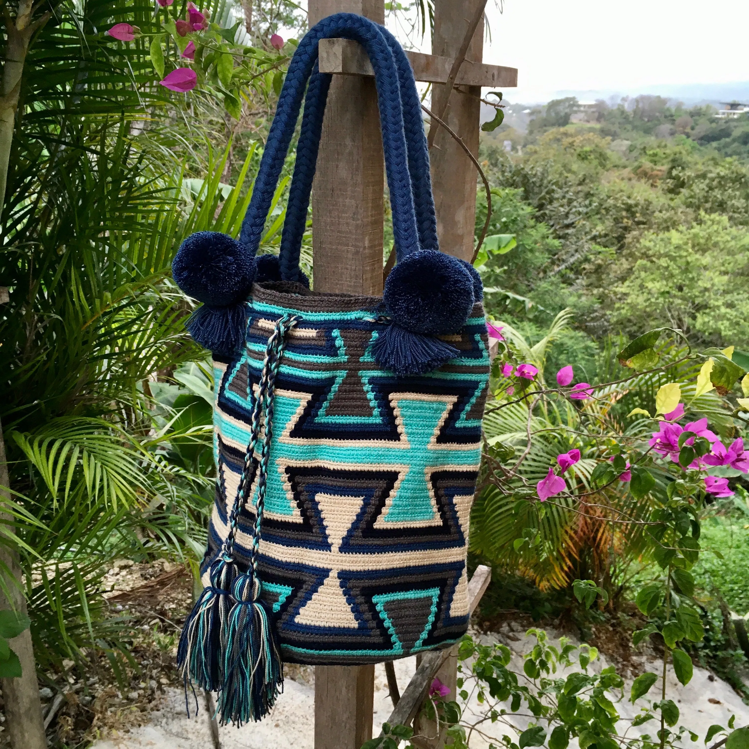 Blue and Grey Hourglass Pom Pom Mochila