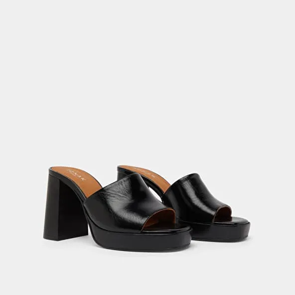 Open-toe mules with high heels in shiny black leather