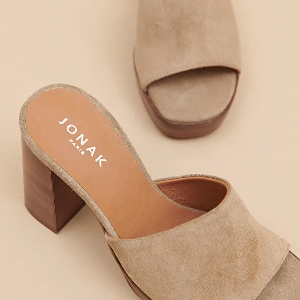 Open-toe mules with high heels in taupe suede